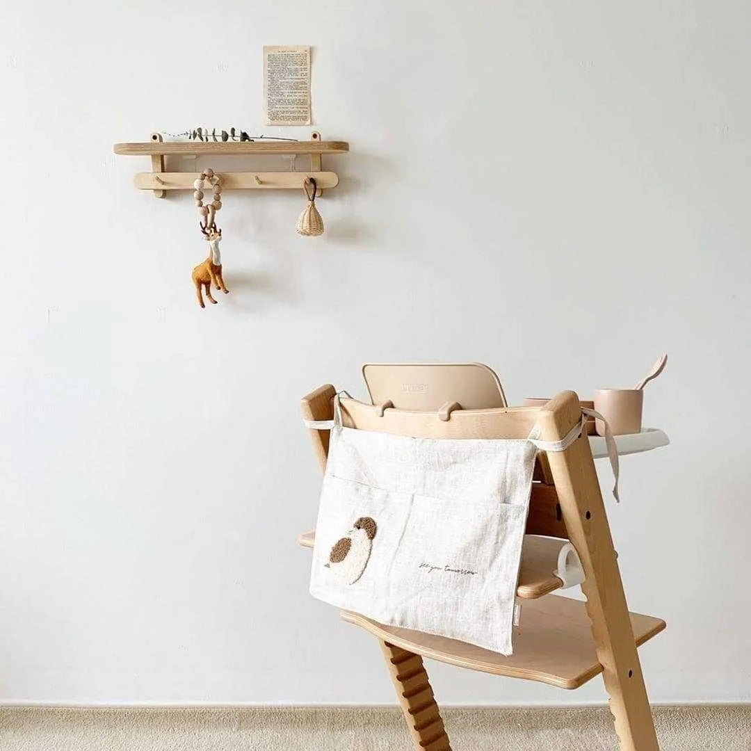 Khaki coloured cotton linen hanging storage bag with one pocket for bedside organisation