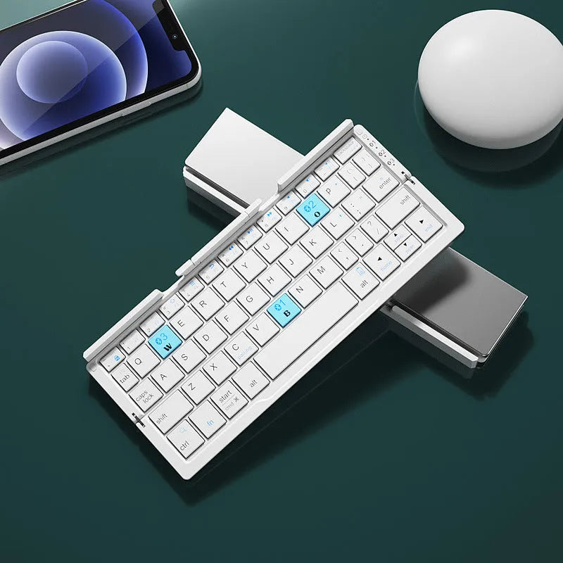Aluminium folding Bluetooth keyboard with stand holding a smartphone