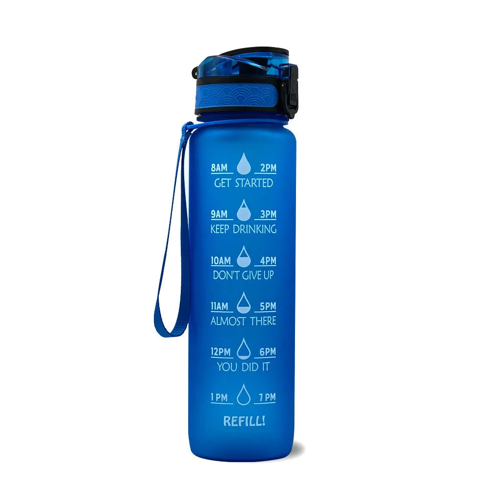 Blue and red gradient 1 litre Tritan sports water bottle with time markers and flip-top lid