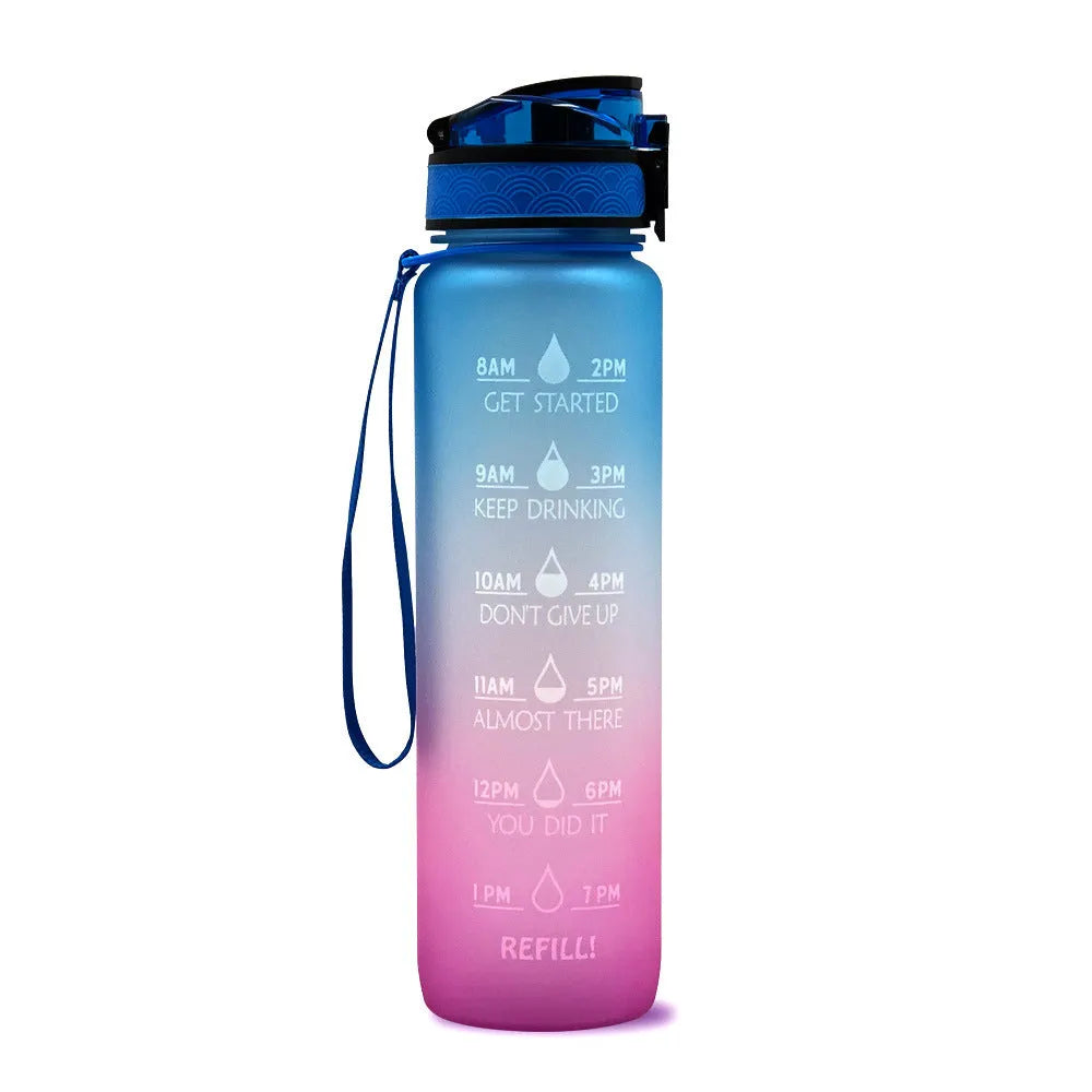 Blue and red gradient 1 litre Tritan sports water bottle with time markers and flip-top lid