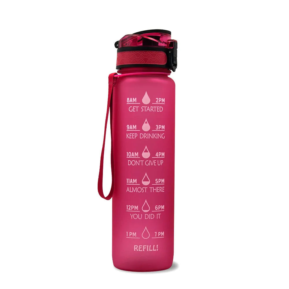 Blue and red gradient 1 litre Tritan sports water bottle with time markers and flip-top lid