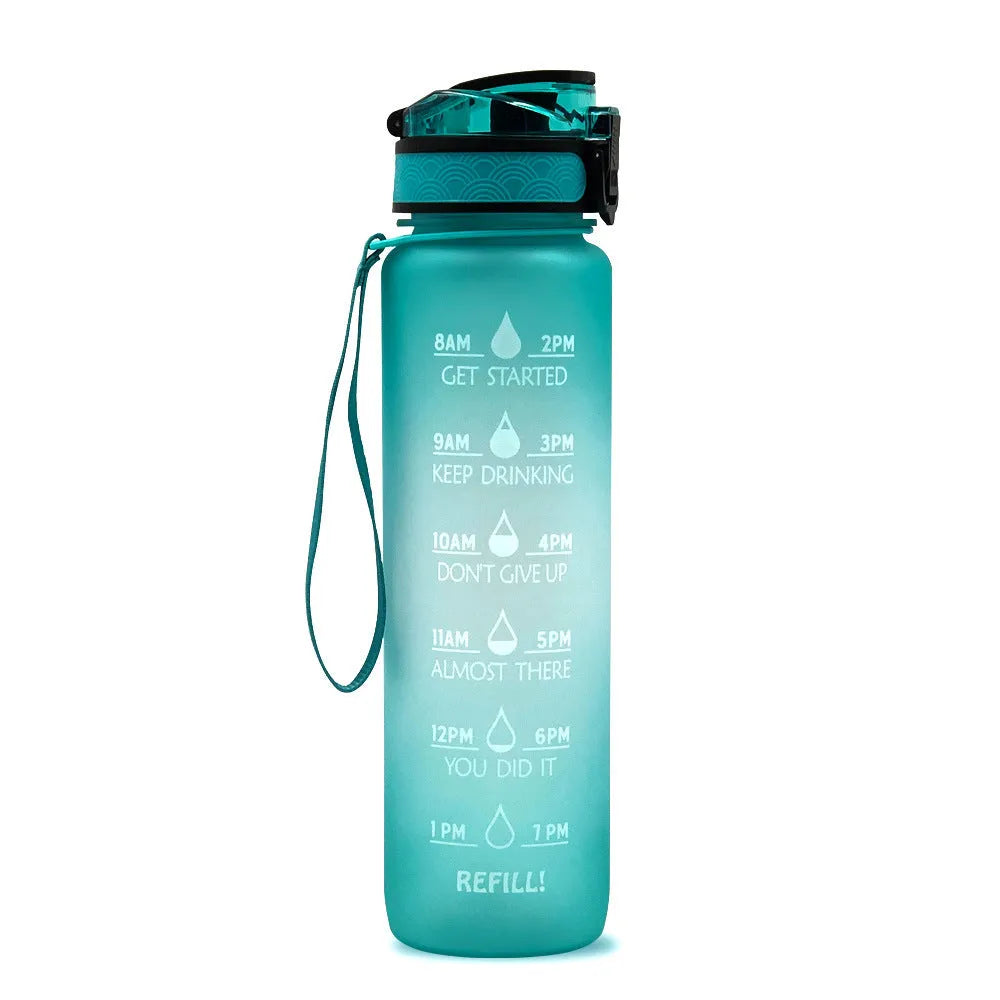 Blue and red gradient 1 litre Tritan sports water bottle with time markers and flip-top lid