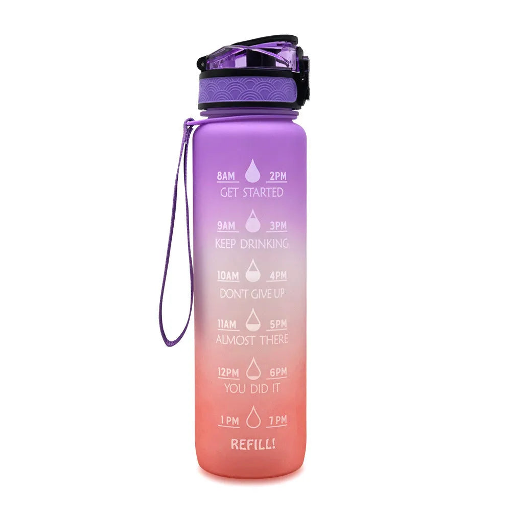 Blue and red gradient 1 litre Tritan sports water bottle with time markers and flip-top lid