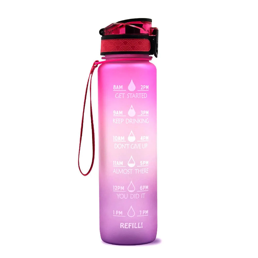 Blue and red gradient 1 litre Tritan sports water bottle with time markers and flip-top lid