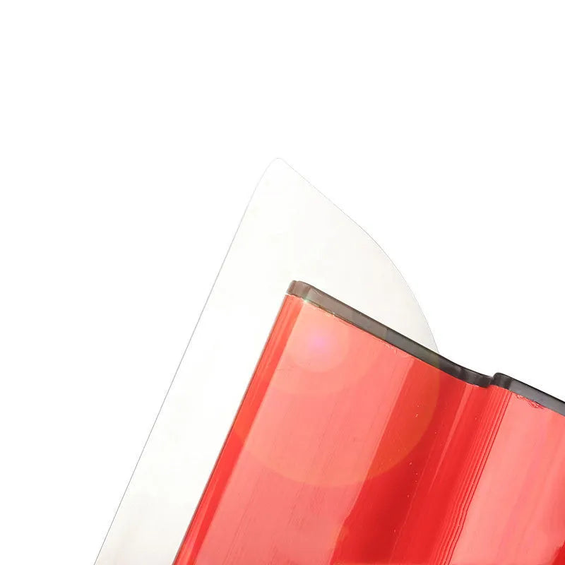 Red metal leveling scraper tool with a 40cm long blade for wall preparation.