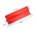 Red metal leveling scraper tool with a 40cm long blade for wall preparation.