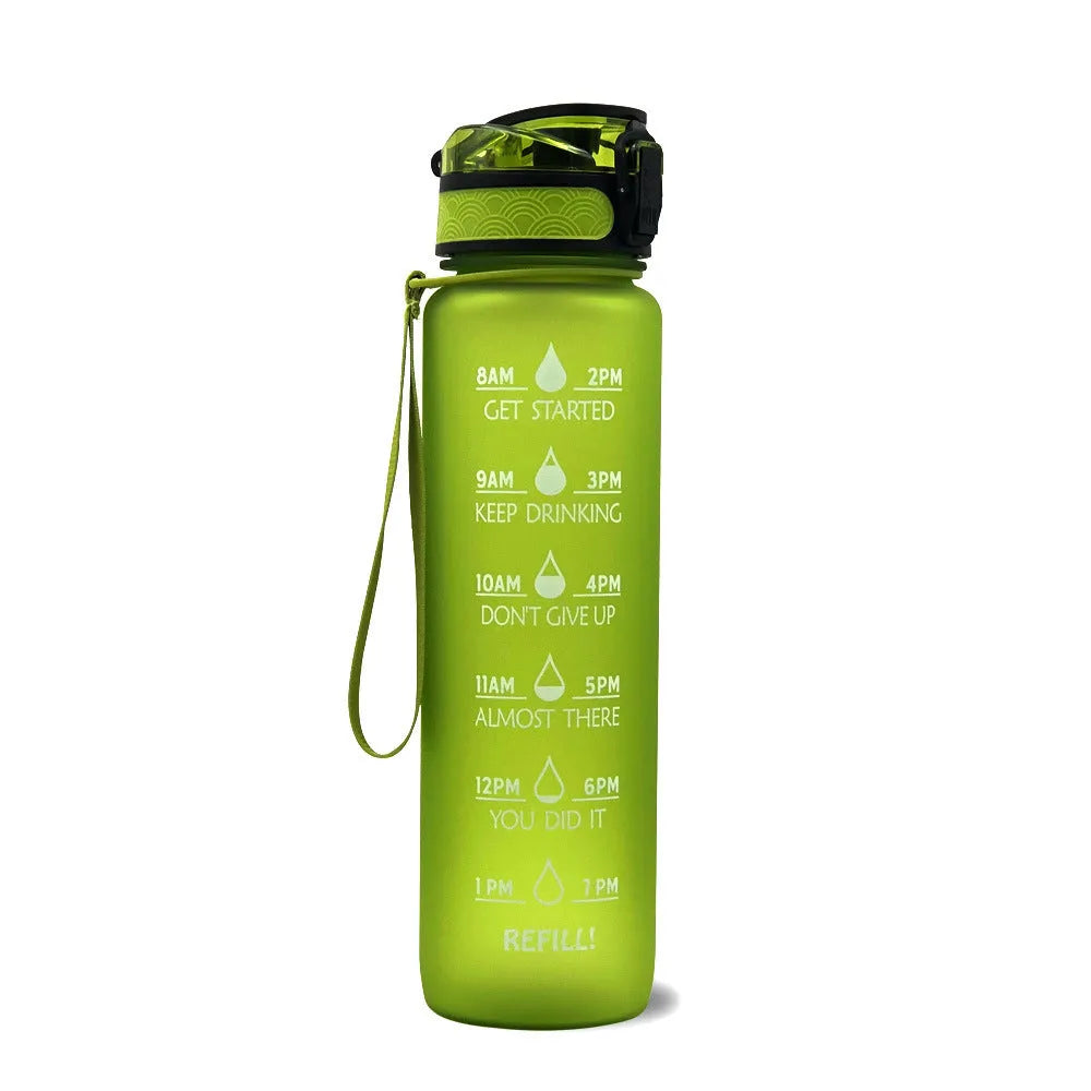 Blue and red gradient 1 litre Tritan sports water bottle with time markers and flip-top lid