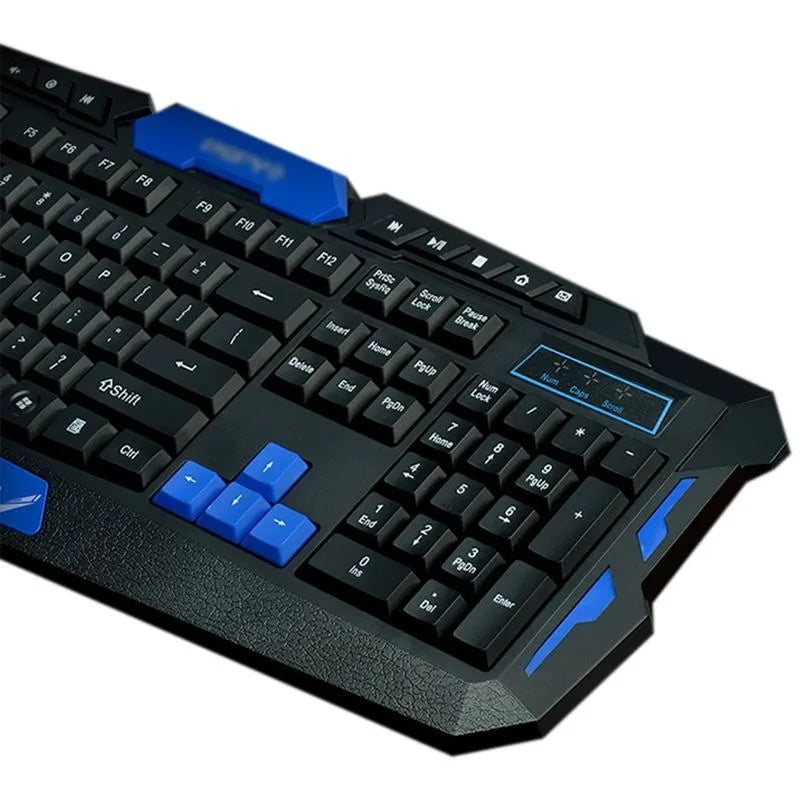Black and blue wireless keyboard and mouse set on a desk, showing full-size keyboard and ergonomic mouse.