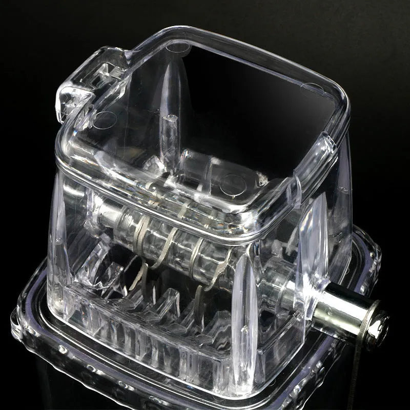 Manual ice crusher with transparent plastic body and stainless steel blade on a kitchen counter