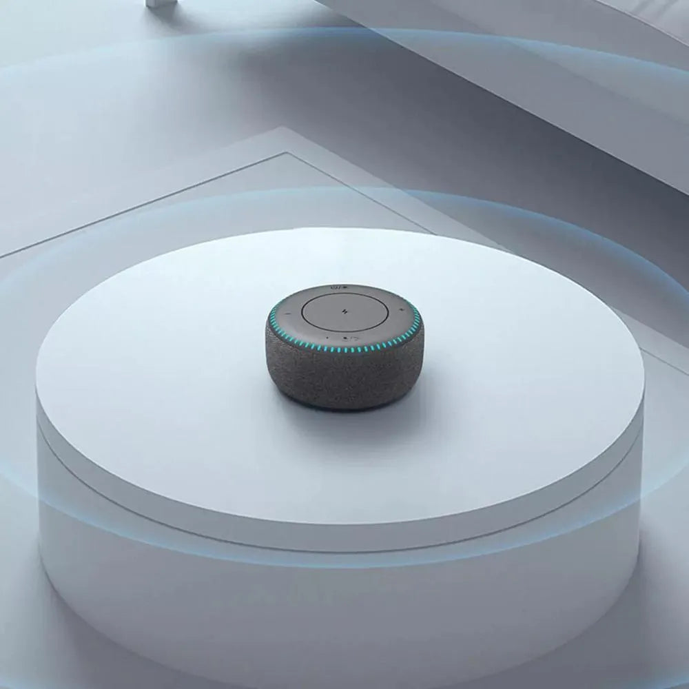 Black Bluetooth speaker with wireless charging surface and white noise function