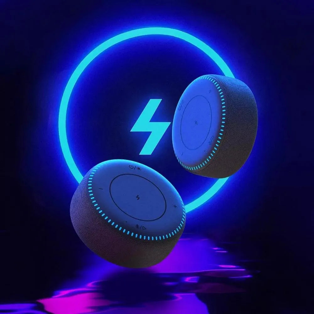 Black Bluetooth speaker with wireless charging surface and white noise function