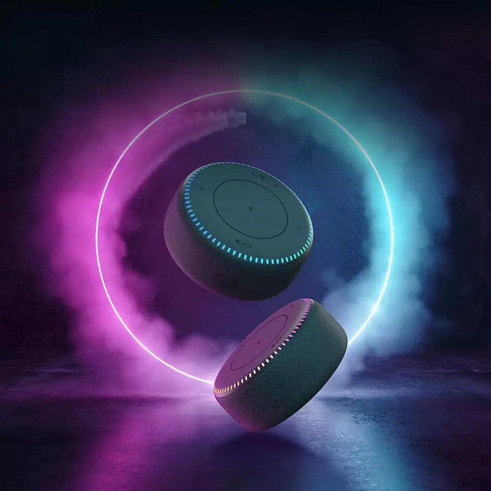 Black Bluetooth speaker with wireless charging surface and white noise function