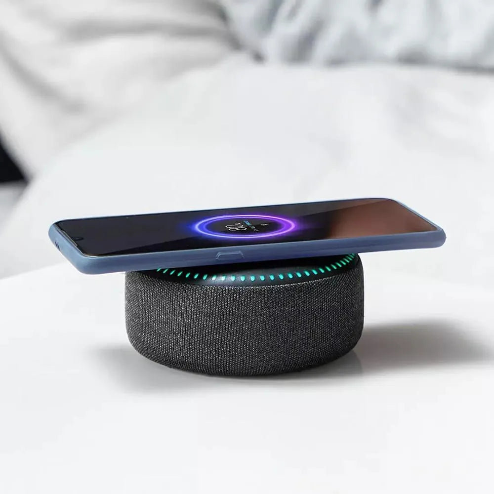 Black Bluetooth speaker with wireless charging surface and white noise function