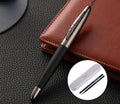 Heavy hand metal jewel signature pen with anti-slip grip on a desk, with blue refill visible