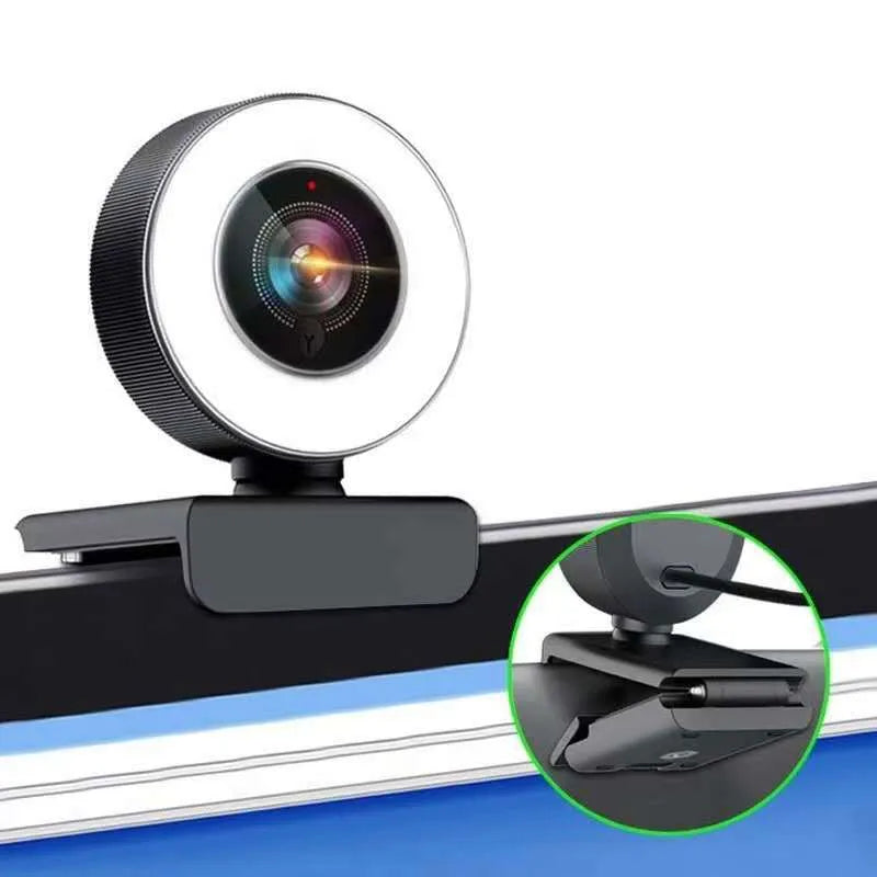 Black 1080p HD USB webcam with built-in fill light for video conferences.