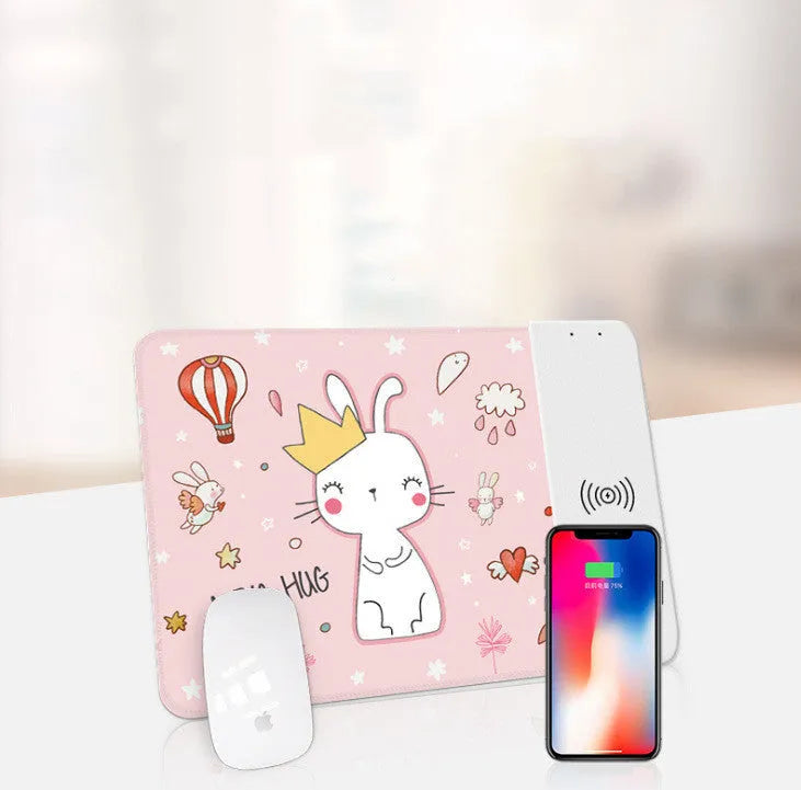 Cartoon wireless charging mouse pad with RGB lighting on a desk