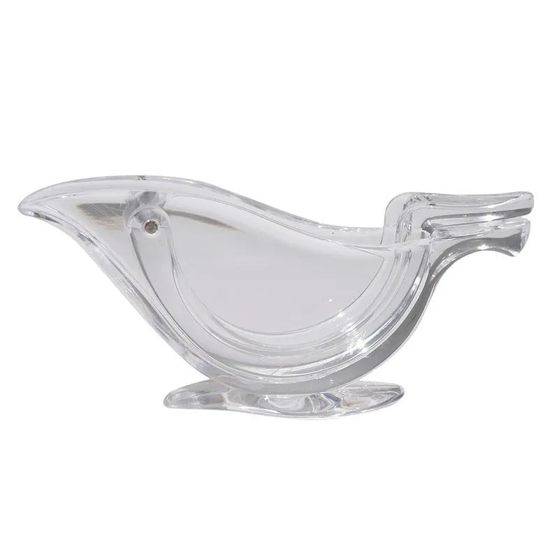 Clear acrylic bird-shaped manual lemon juicer kitchen gadget on countertop