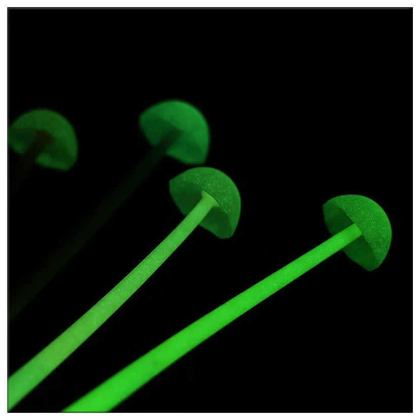 Luminous mushroom silicone gel pen in black with soft grip body and cartoon design on white background