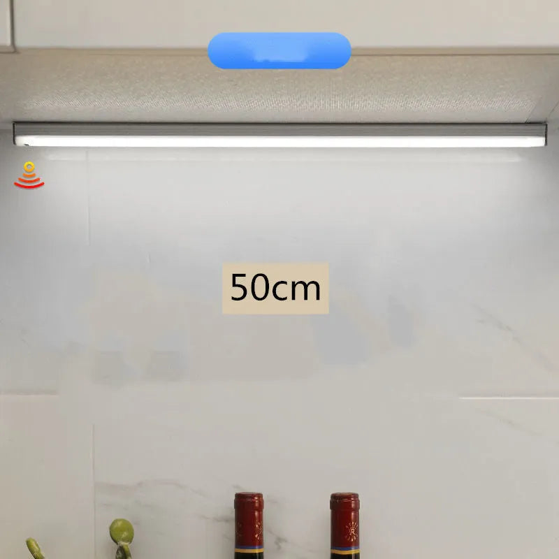 Hand-scanning induction cabinet lamp strip with magnetic mounting and adhesive backing for wire-free installation