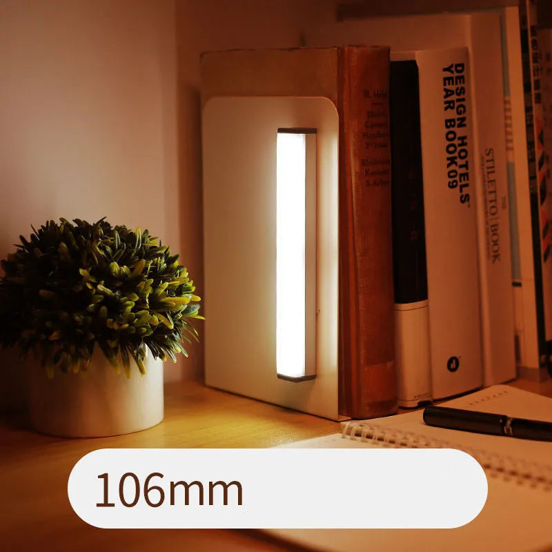 Hand-scanning induction cabinet lamp strip with magnetic mounting and adhesive backing for wire-free installation