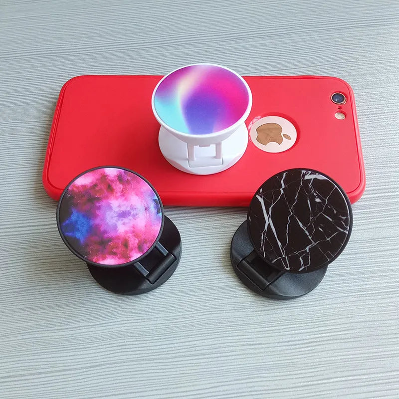 Folding mobile phone holder with thermal transfer aluminium sheet decoration on desktop