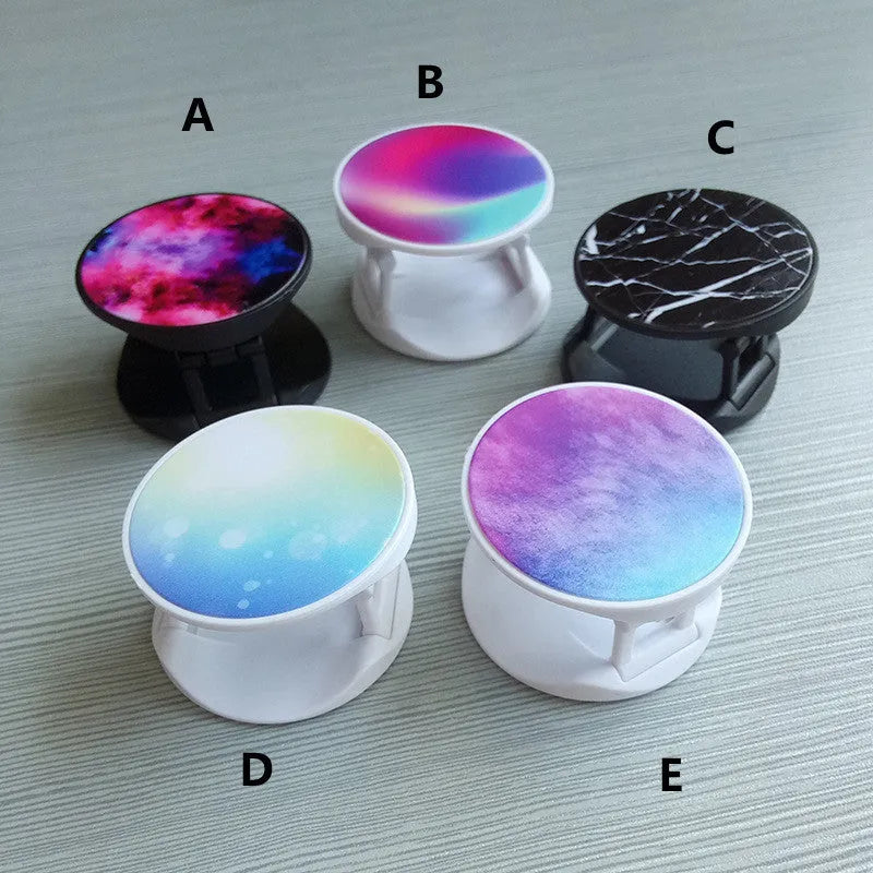 Folding mobile phone holder with thermal transfer aluminium sheet decoration on desktop