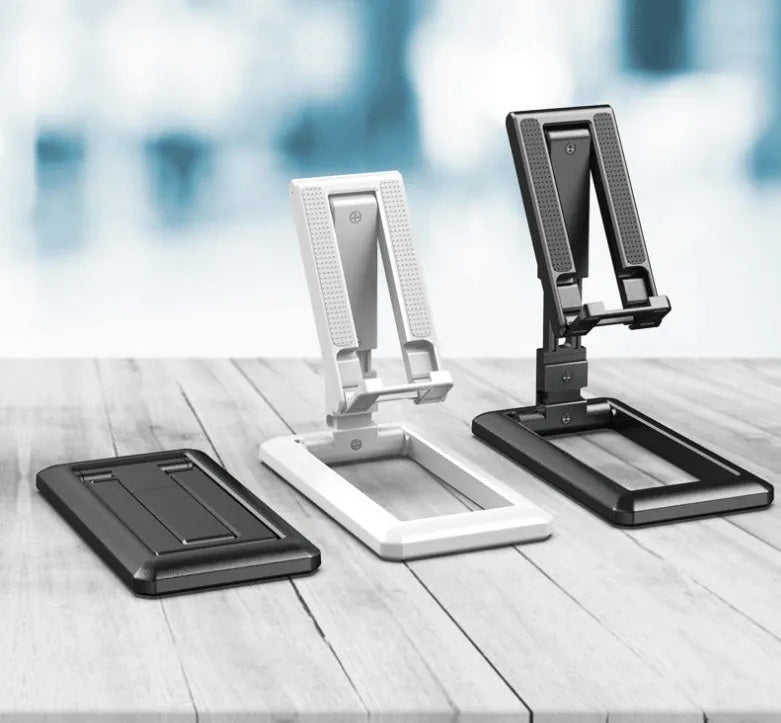 A retractable, foldable mobile phone desktop stand in an extended position, holding a smartphone.