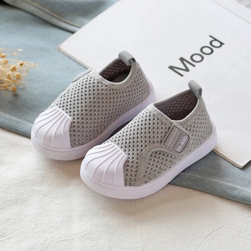Children's striped casual sneakers with a soft non-slip PVC sole, shown in yellow, grey, black, and rubber powder colours.