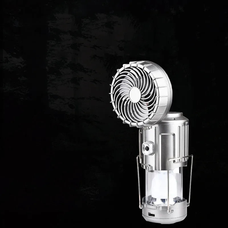 Solar electric fan lantern with waterproof casing and LED light in silver colour for camping use