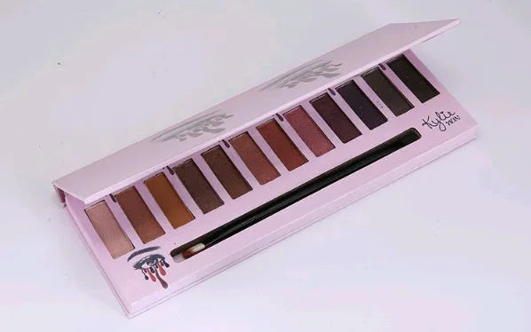 Kelly 12 colour matte eyeshadow palette in compact case with multiple neutral shades visible