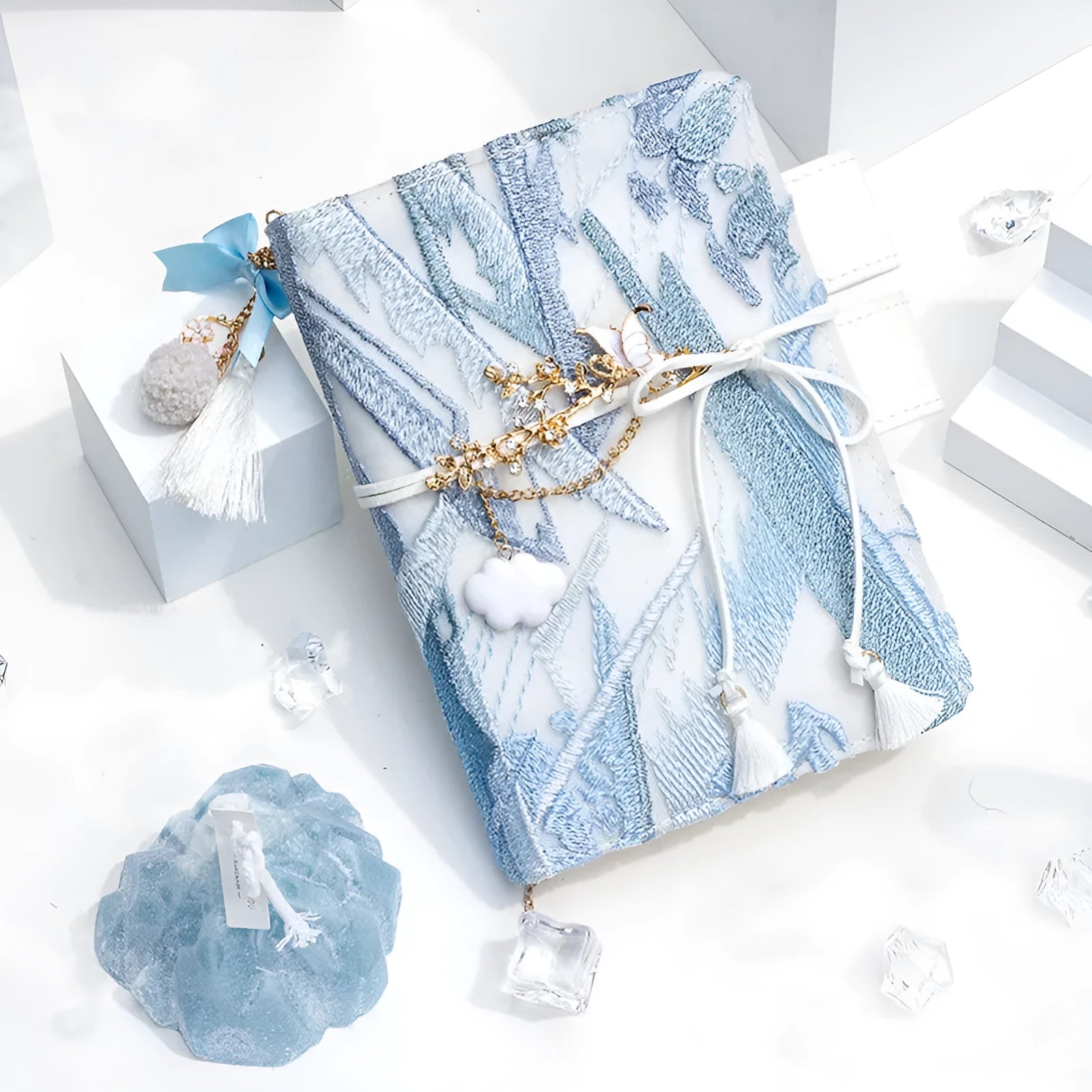 Glacier embroidery fabric notebook in A6 and A5 sizes with grid pages.