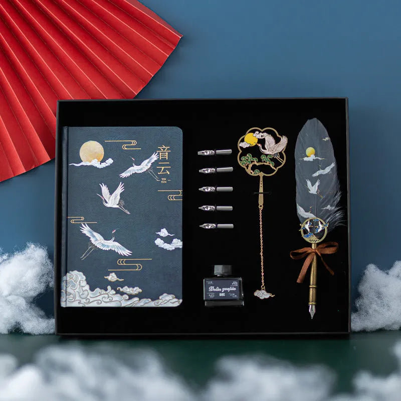 Chinese style metal shell feather pen set with four packs of coloured feathers and a notebook.