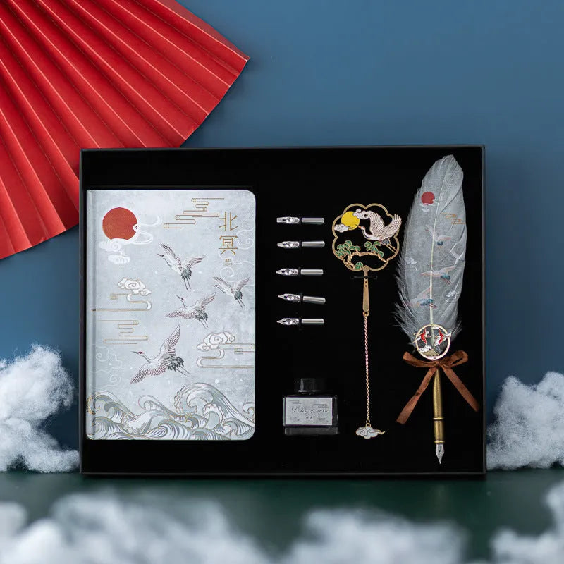 Chinese style metal shell feather pen set with four packs of coloured feathers and a notebook.