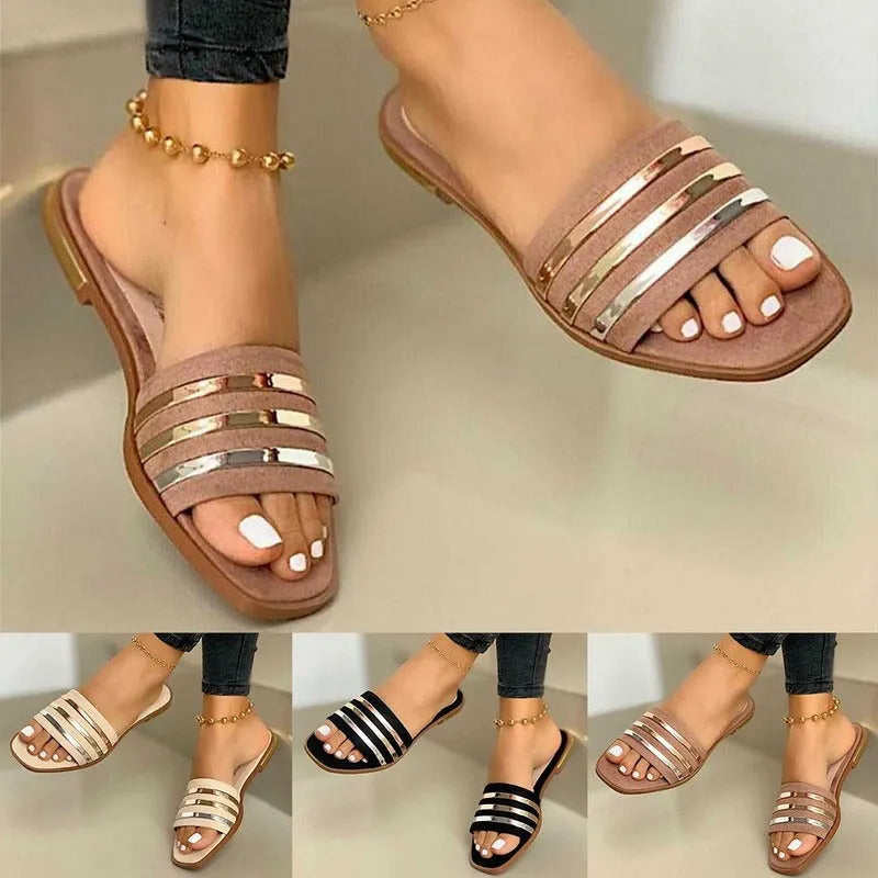 Women's flat slippers in pink with PVC upper and TPR sole, side view
