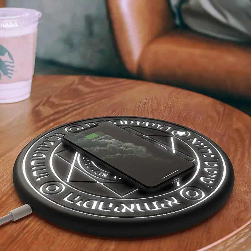 Square black 10W fast wireless charging pad with glowing magic array pattern for Qi phones