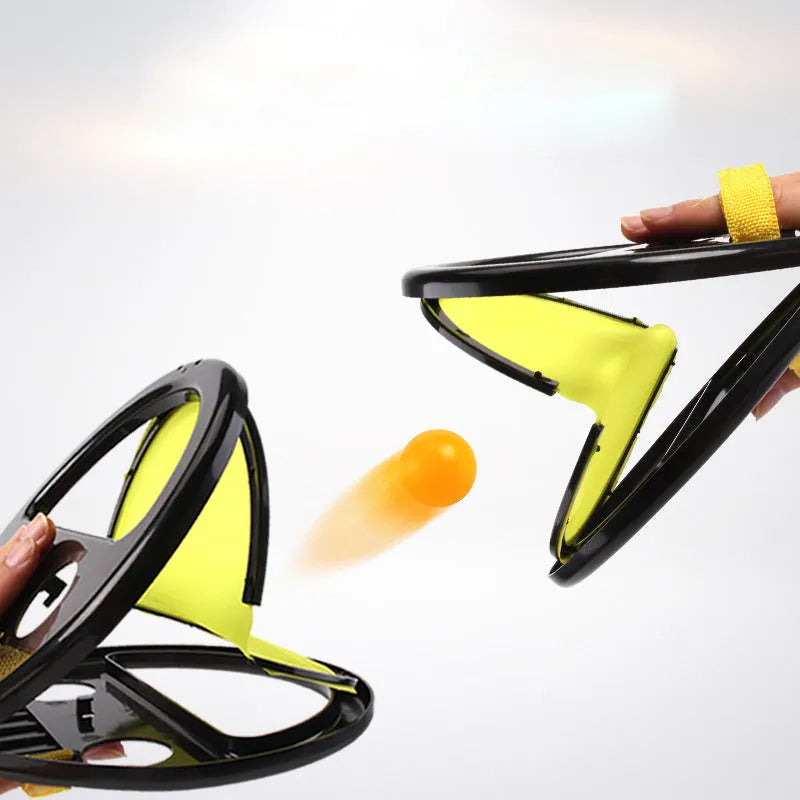 Yellow ABS hand catching ball racket with 20cm diameter surface for parent-child outdoor fitness play