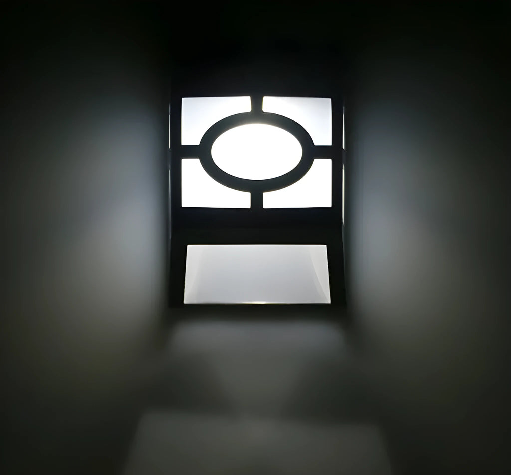 Retro-style white plastic solar wall light with two LEDs and a manual switch on the front.