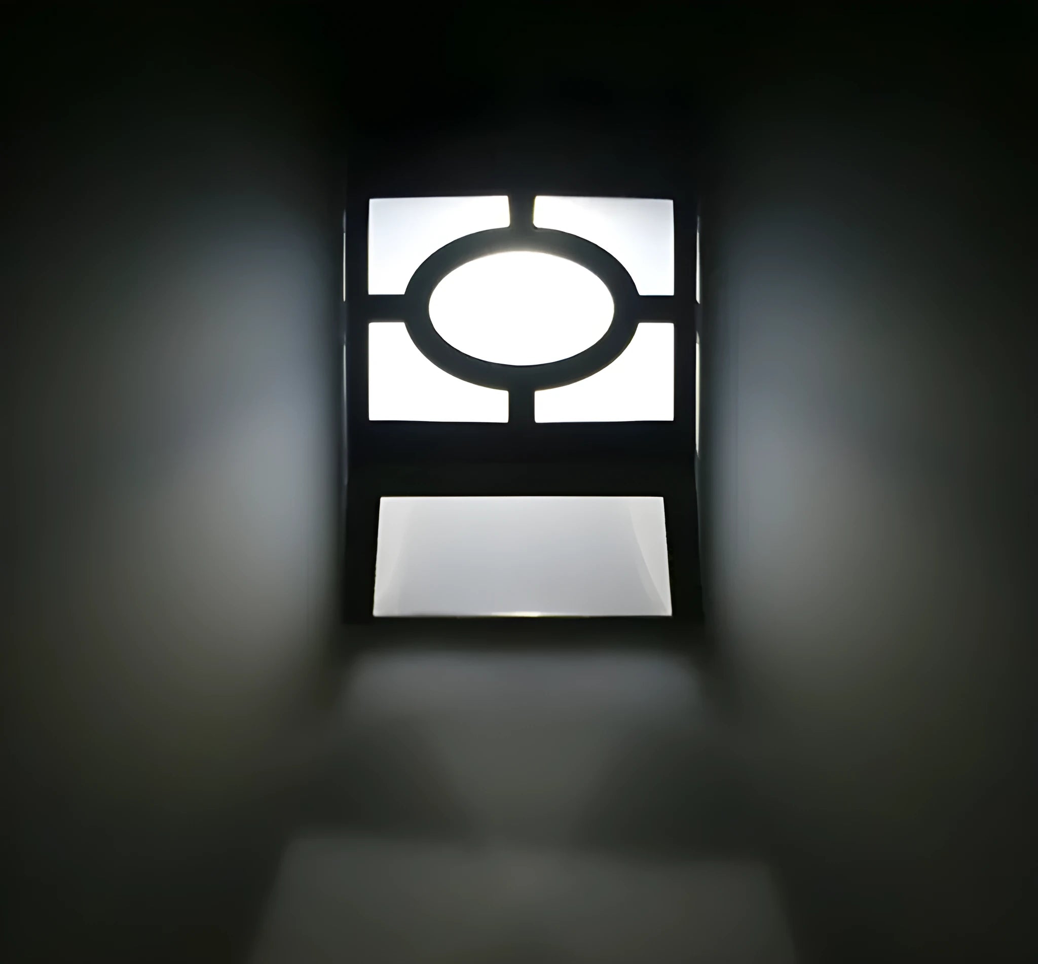 Retro-style white plastic solar wall light with two LEDs and a manual switch on the front.