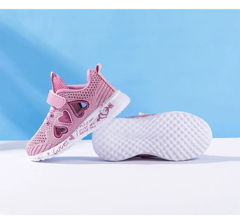 Children's pink and purple mesh sneakers with Velcro strap and cartoon pattern.