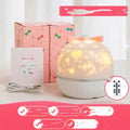 Rotating star projector night light with six film discs and rechargeable battery