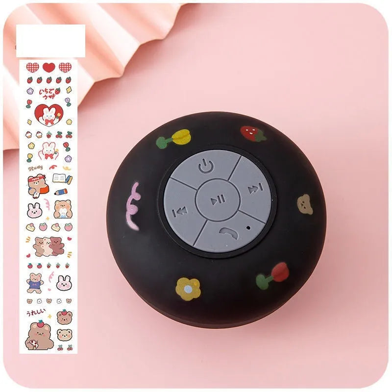 Mini Bluetooth speaker with silicone suction cup base in five colour options