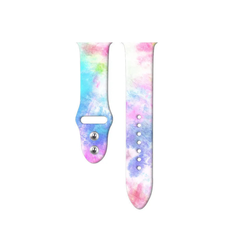 Colourful tie-dye silicone Apple Watch band with connector, shown alongside long and standard length options.