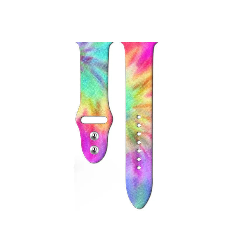 Colourful tie-dye silicone Apple Watch band with connector, shown alongside long and standard length options.