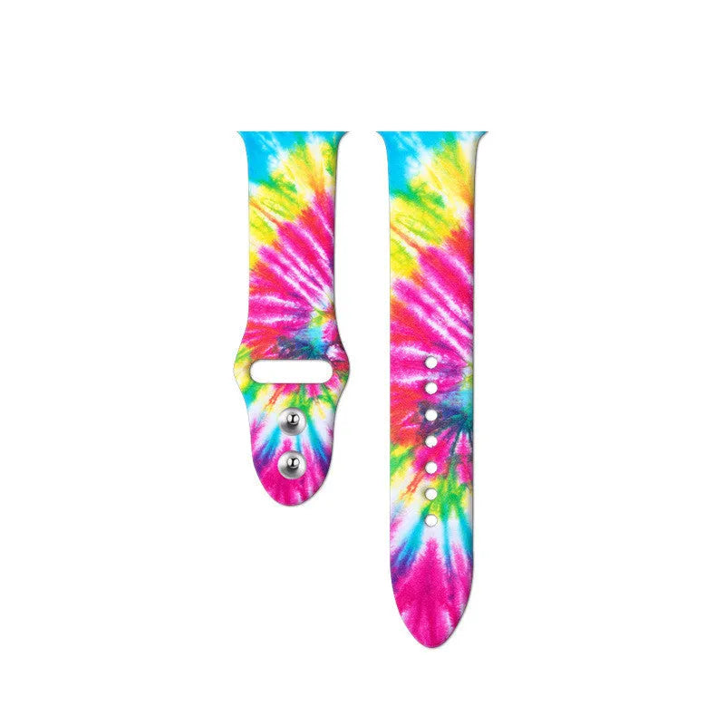Colourful tie-dye silicone Apple Watch band with connector, shown alongside long and standard length options.