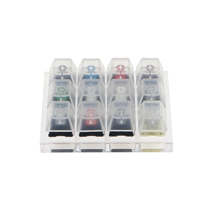Cherry MX twelve-axis mechanical keyboard switch tester with Black Green Black Tea Milk Green switches in white housing