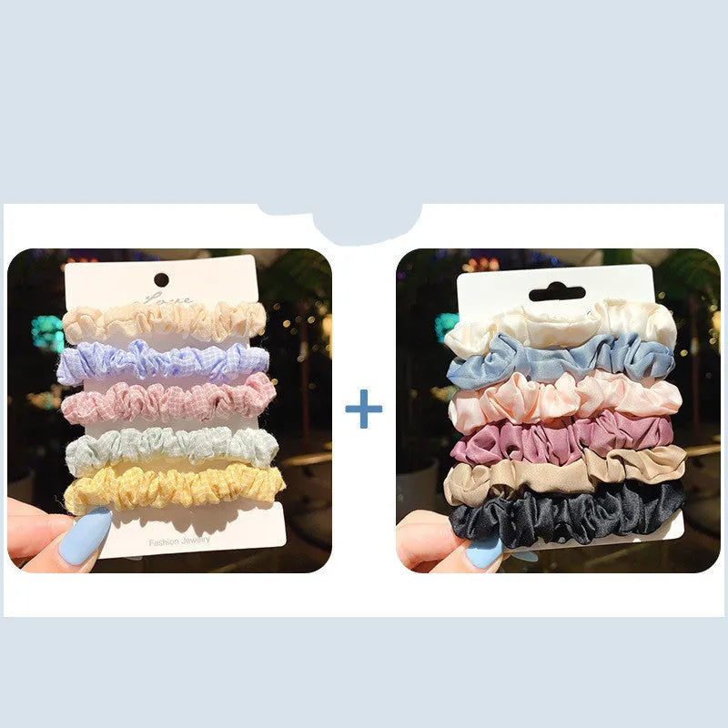 Assortment of children's hair rings and head ropes in Autumn colours including macaron designs.