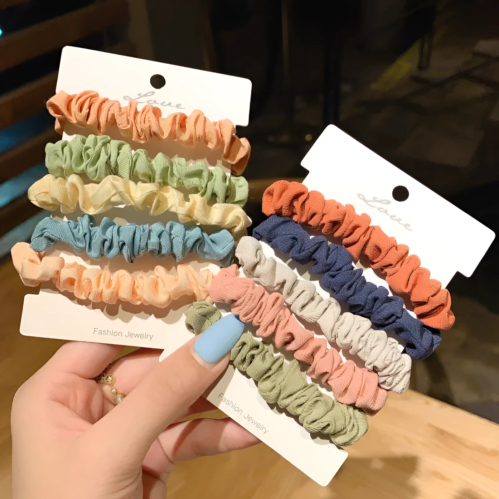 Assortment of children's hair rings and head ropes in Autumn colours including macaron designs.