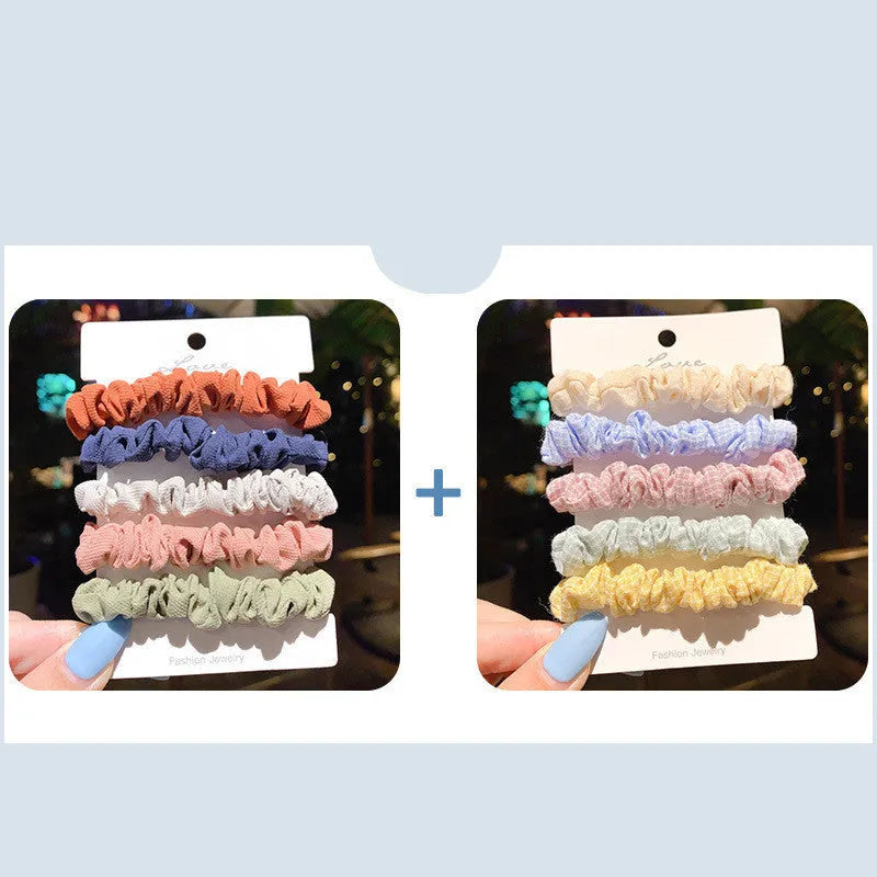 Assortment of children's hair rings and head ropes in Autumn colours including macaron designs.