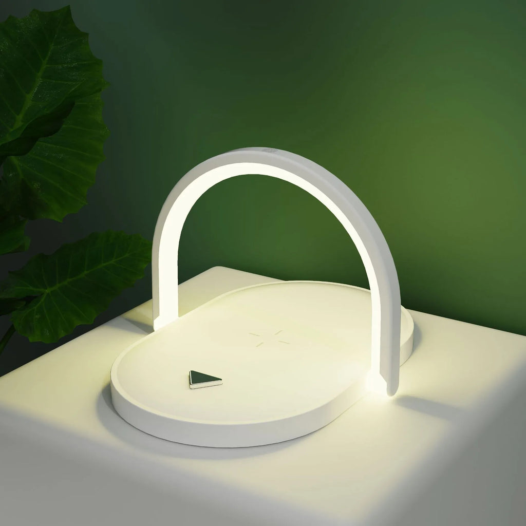 Black and white wireless charging station with night light and phone holder