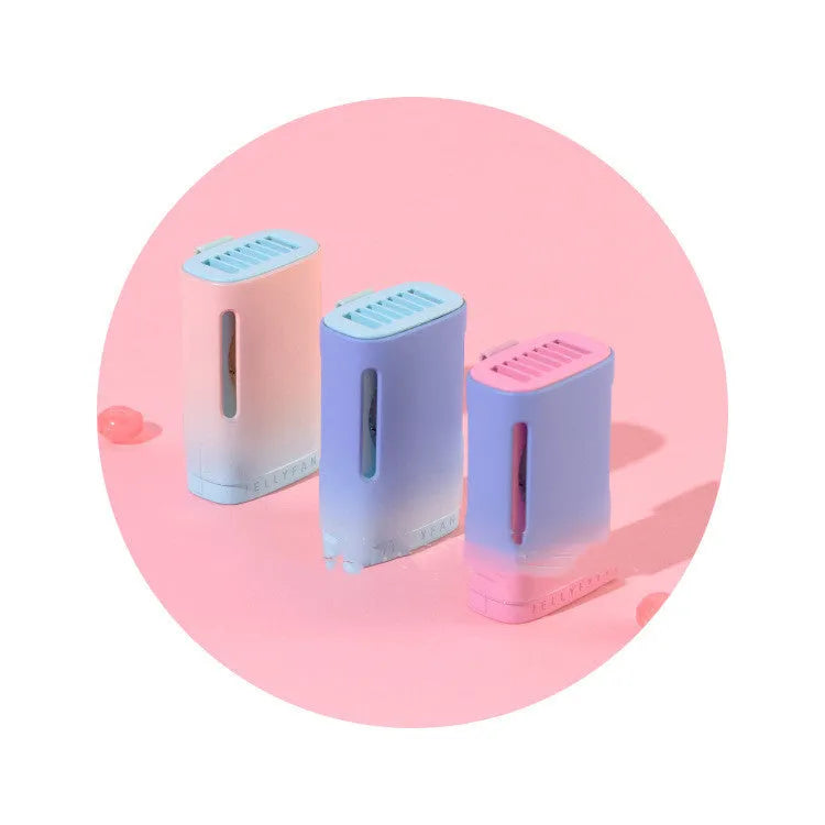 Jelly design mini USB fan shown in mint peach colour, featuring a compact body and a detachable neck strap.